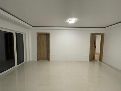 Apartament de 57 mp utili+150 mp grădină ,parcare,zona Tineretului
