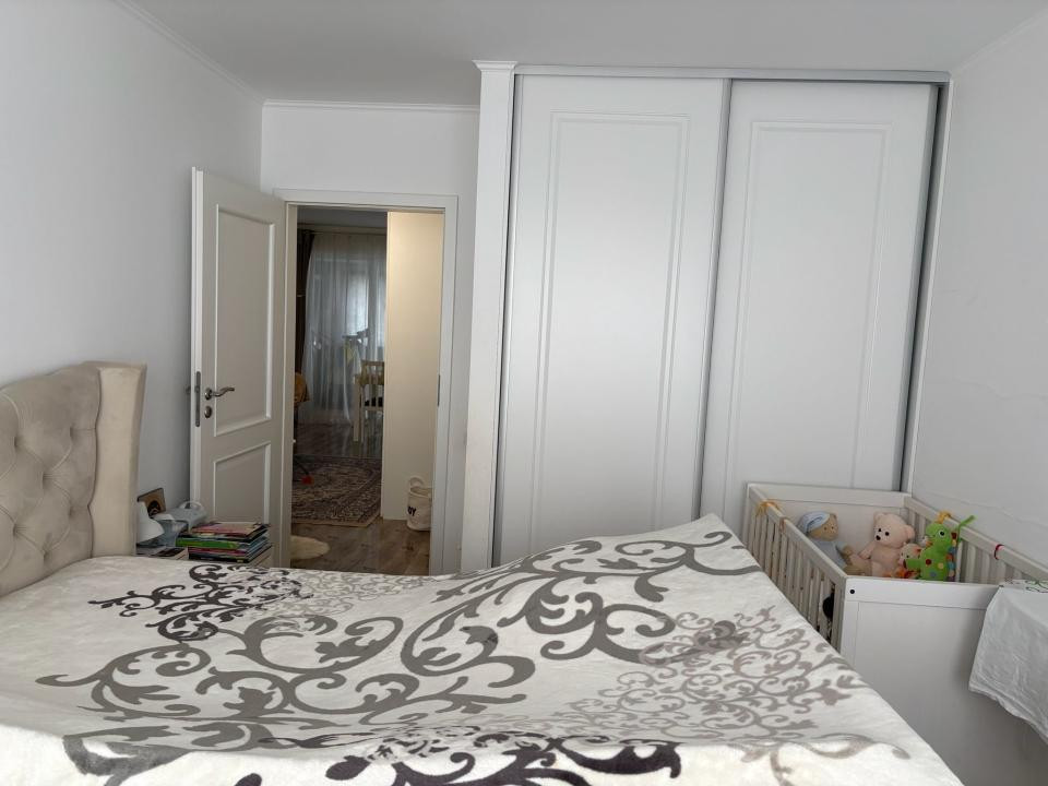 Apartament cu 3 camere,etaj 1,garaj de 30 mp