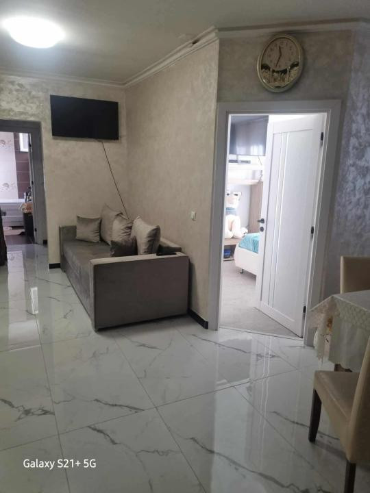 Apartamnet cu 3 camere,gradinaa si parcare cu CF,zona Eroilor-Floresti
