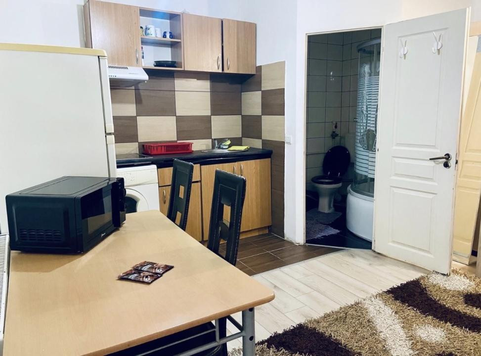 Apartament de 36 mp utili, parcare, la parter 
