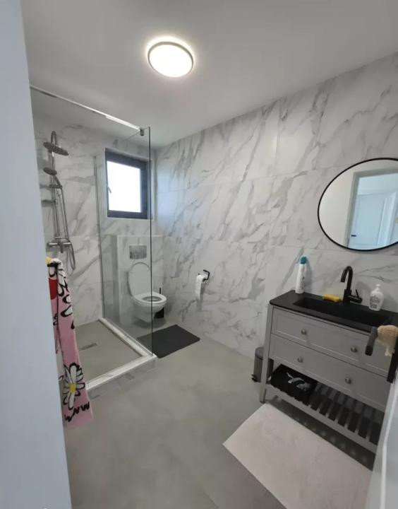 Casă individuala de vanzare cu 4 camere, amplasata pe un teren de 412 mp!