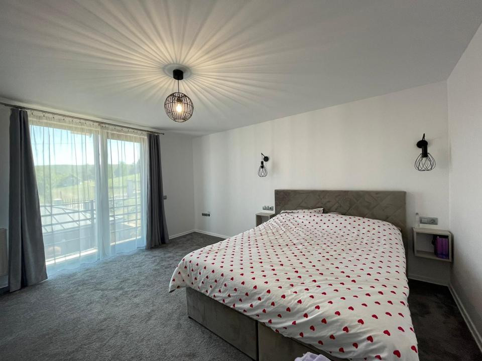 Casă individuala de vanzare cu 4 camere, amplasata pe un teren de 412 mp!