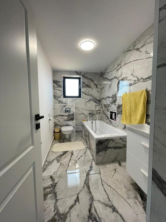 Casă individuala de vanzare cu 4 camere, amplasata pe un teren de 412 mp!