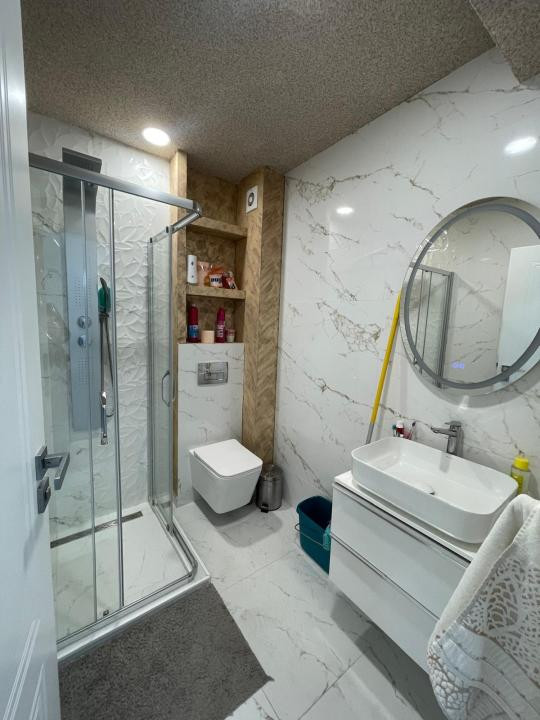 Apartament modern, 3 camere, 2 bai, parcare subterana in zona Terra!