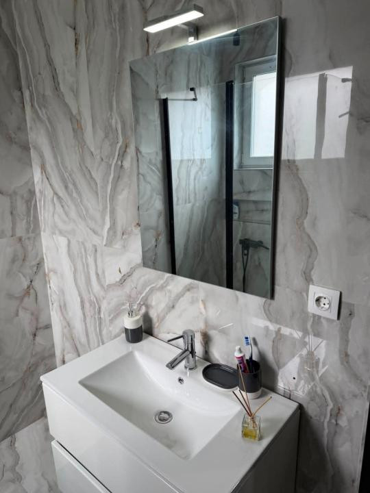 Apartament nou , 3 camere, parcare ,etaj 1