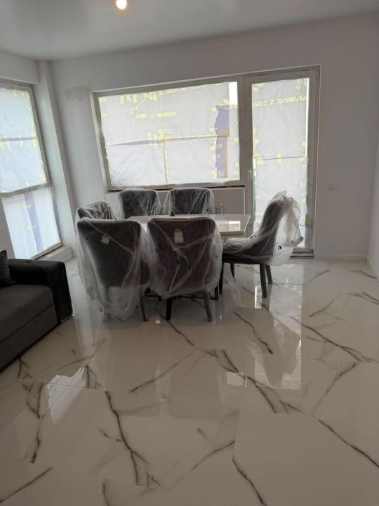 Apartament nou , 3 camere, parcare ,etaj 1