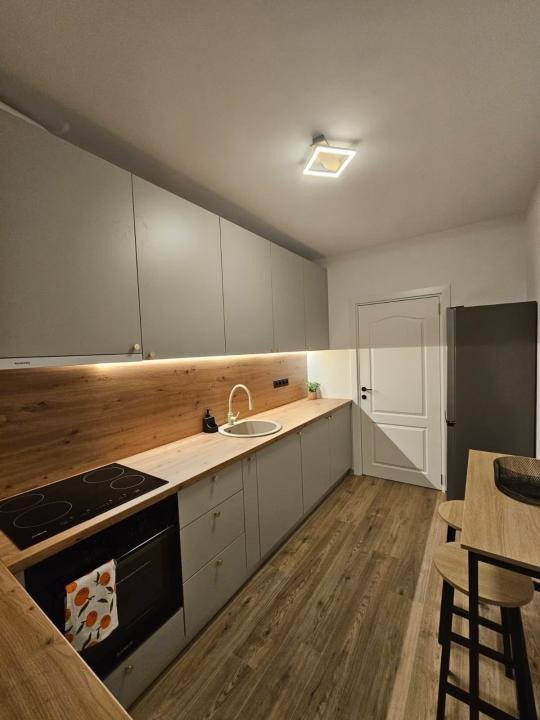 Apartament 2 camere superfinisat, decomandat, 55mp, Parcare/zona Terra