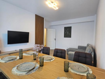 Apartament 2 camere superfinisat, decomandat, 55mp, Parcare/zona Terra