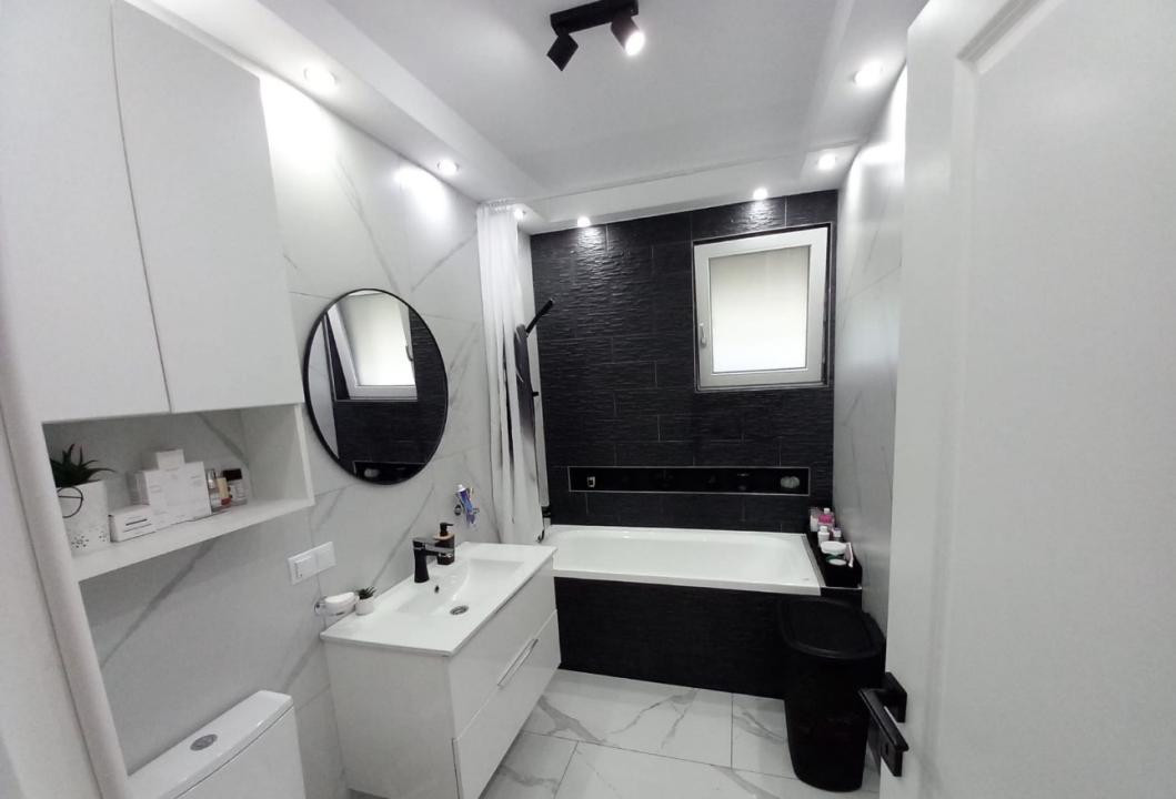 Apartament cu 3 camere , terasa 20 mp,parcare subterana,strada Eroilor