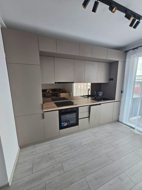 Apartament  cu 3 camere,2bai si 2 parcari