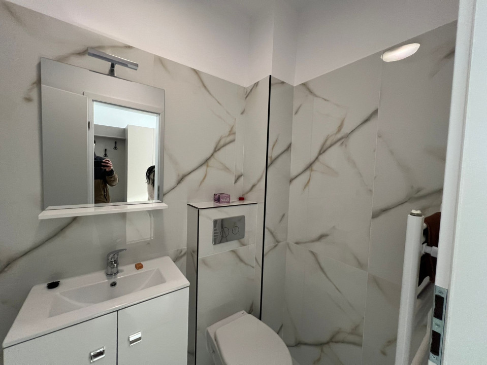 Apartament  cu 3 camere,2bai si 2 parcari