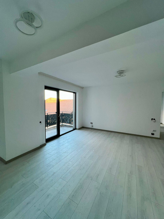 Apartament 3 camere, 70 mp utili, balcon, parcare, finisat, zona Pod IRA