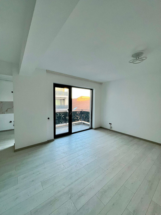 Apartament 3 camere, 70 mp utili, balcon, parcare, finisat, zona Pod IRA