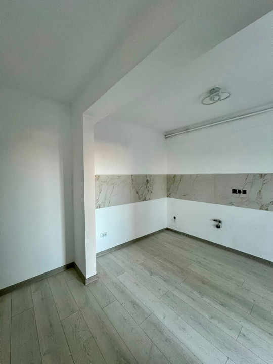 Apartament 3 camere, 70 mp utili, balcon, parcare, finisat, zona Pod IRA