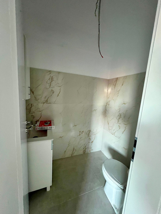 Apartament 3 camere, 70 mp utili, balcon, parcare, finisat, zona Pod IRA