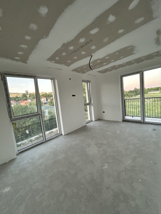 Duplex semifinisat Chinteni 120mp utili in ansamblu privat de case 