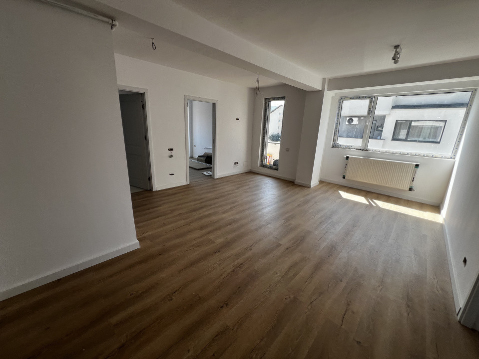 Apartament de 3 camere, doua bai, doua balcoane, 66mp utili, zona Florilor