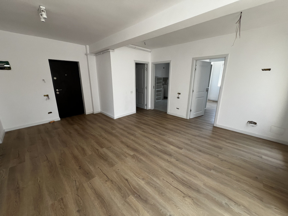 Apartament de 3 camere, doua bai, doua balcoane, 66mp utili, zona Florilor