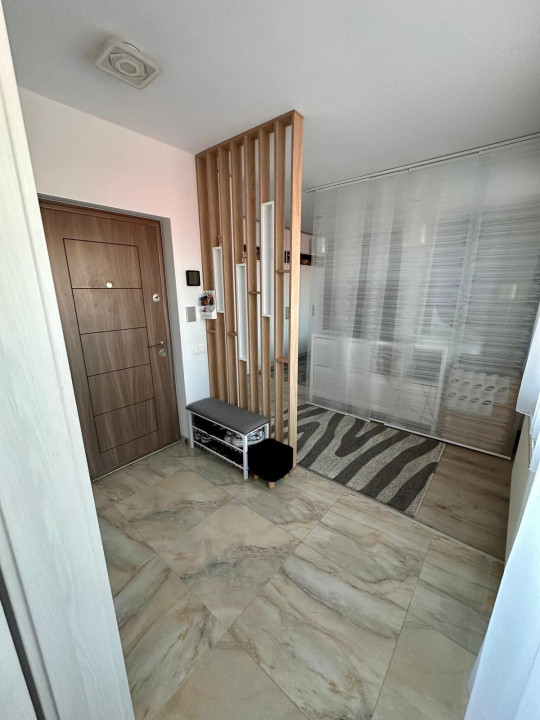 apartament cu  3camere decomandate,2 bai si parcare subterana zona sub cetate