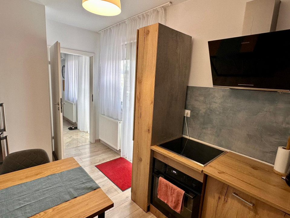 apartament cu  3camere decomandate,2 bai si parcare subterana zona sub cetate